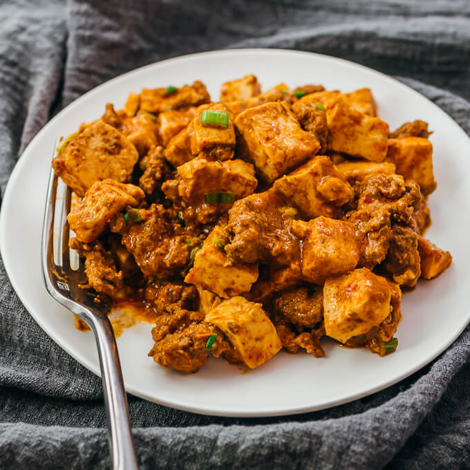 mapo tofu served on white plate