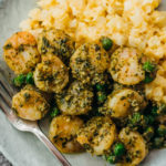 close up view of pesto shrimp on plate