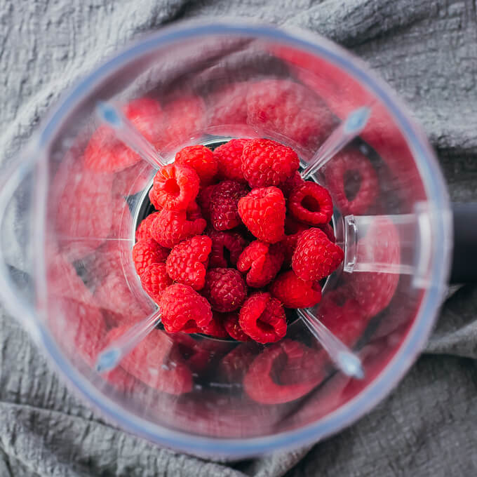 fresh raspberries in blender container