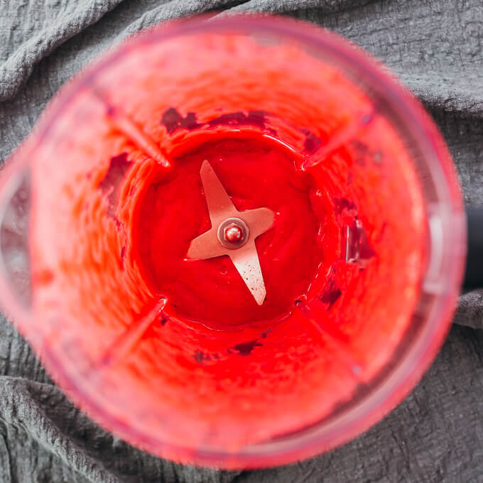 pureed raspberries in blender cup