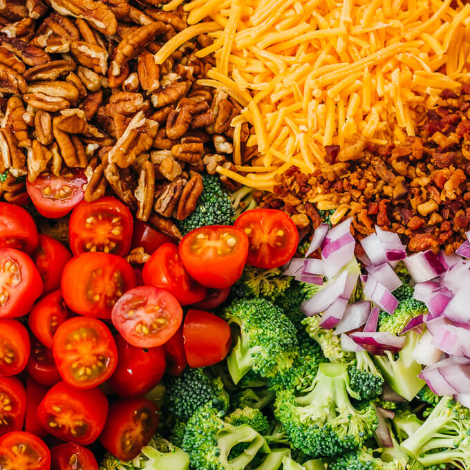 broccoli salad ingredients in wooden bowl