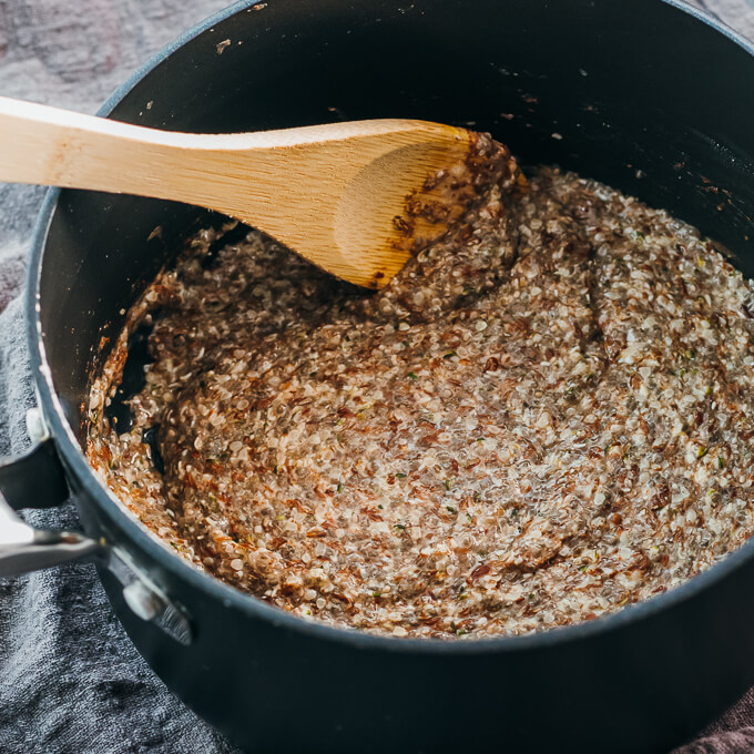 stirring keto oatmeal inside saucepan