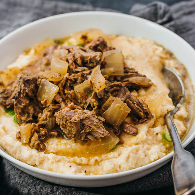 lamb stew served over mashed cauliflower