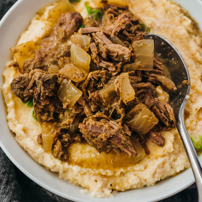 lamb stew served over mashed cauliflower