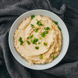 mashed cauliflower topped with sliced scallions