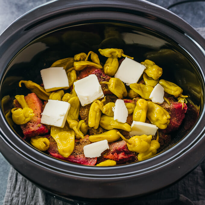 pot roast raw ingredients in slow cooker