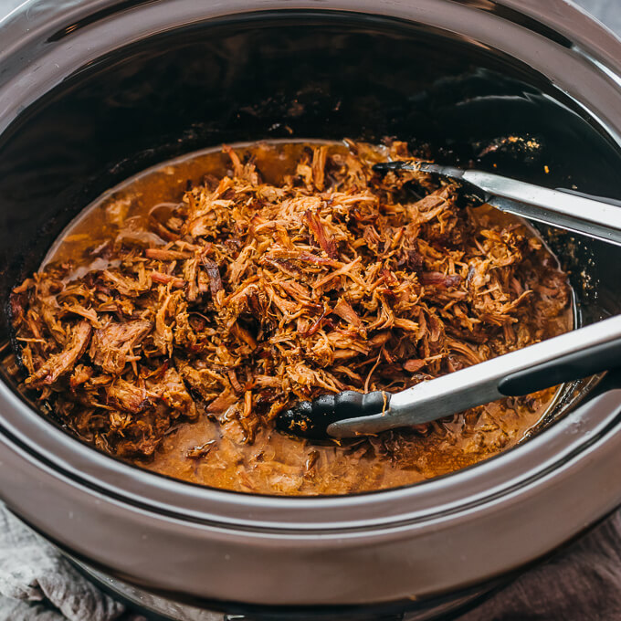 adding seared beef back to slow cooker