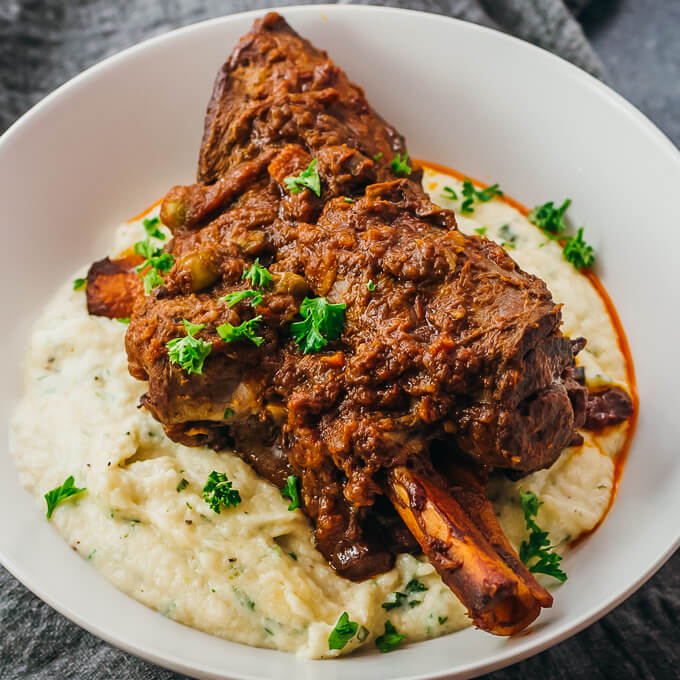 lamb shank served over mashed cauliflower