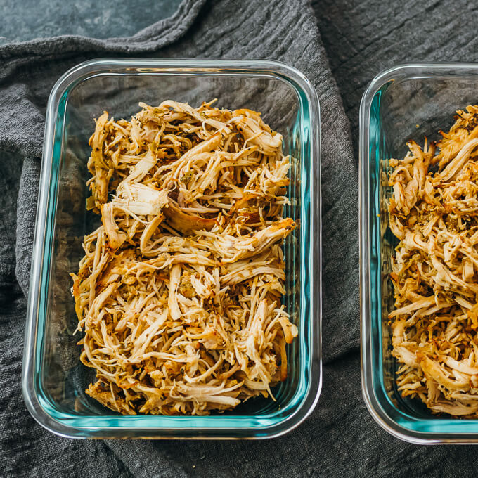 chicken carnitas stored in glass containers