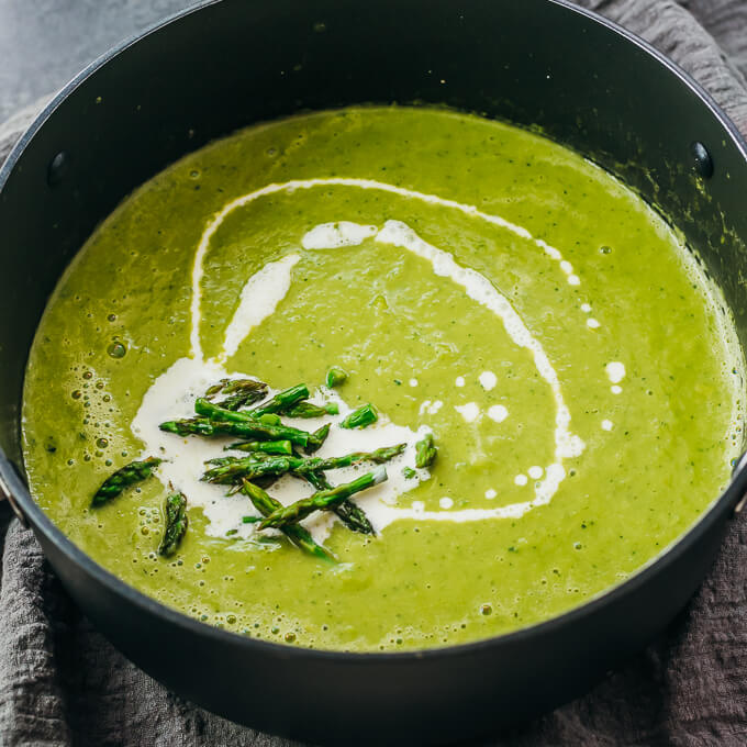 stirring in cream and asparagus tips