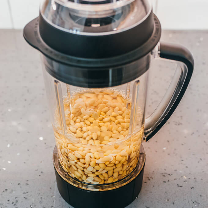 soy beans and water in a blender