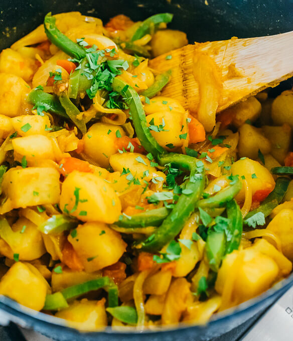 cooking potato curry in pot