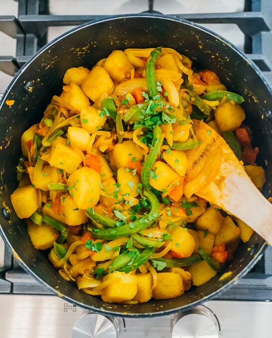 cooking potato curry in pot